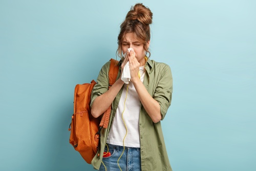 Woman Blowing Her Nose